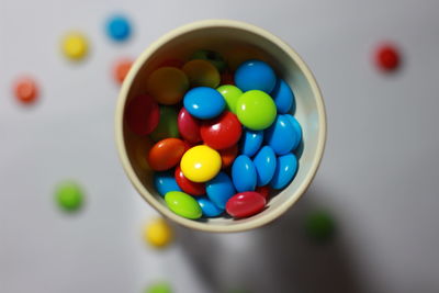 Directly above shot of multi colored candies on table