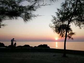 Scenic view of sea at sunset