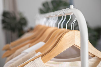 Close-up of clothes hanging on rack