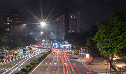 Light trails on city street at night