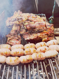 Close-up of meat on barbecue grill