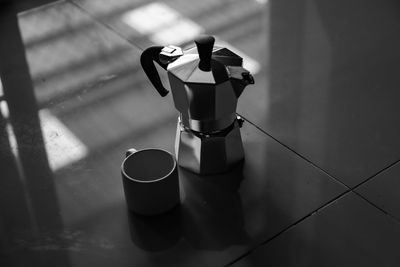 High angle view of coffee cup on table