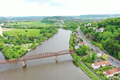 High angle view of river amidst plants against sky