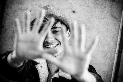 Portrait of young man gesturing