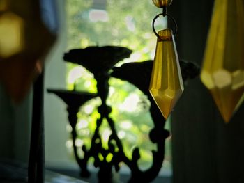 Close-up of illuminated electric lamp at home