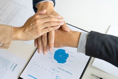 High angle view of couple holding hands