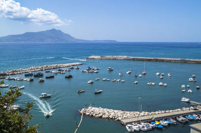 High angle view of sea against blue sky