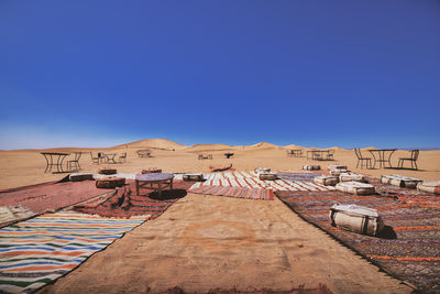 High angle view of townscape against clear blue sky