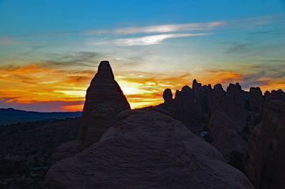 Scenic view of landscape against sky during sunset