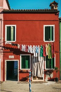 Clothes drying against built structure