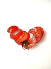 Close-up of strawberry over white background