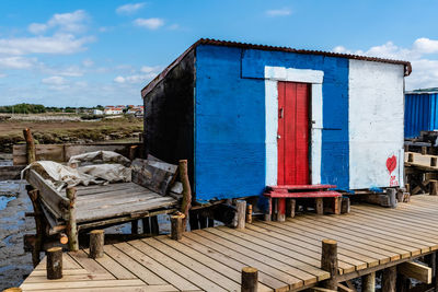 Abandoned building against blue sky