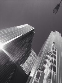 Low angle view of modern buildings against sky