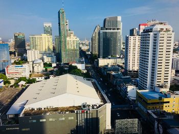 High angle view of buildings in city against sky