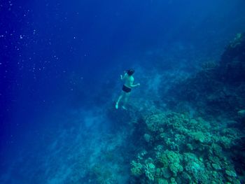 Man swimming in sea