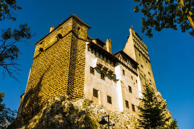 Low angle view of old building against sky