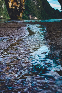 Surface level of water flowing over rocks