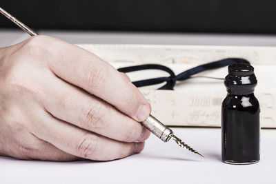 Close-up of man holding hand