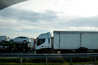 Train on railroad track against sky