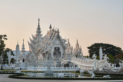 Sculpture of building against clear sky