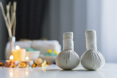 Close-up of candles on table