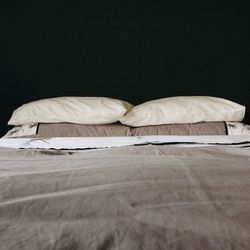 Pillows on bed in bedroom