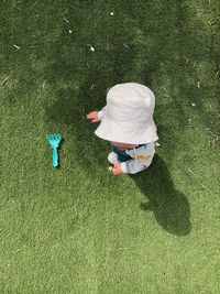 Little boy and the grass