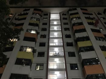 Low angle view of illuminated buildings at night