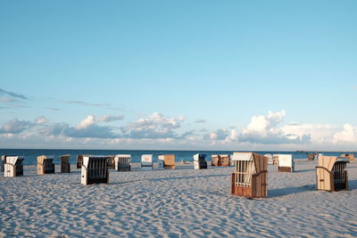 Scenic view of beach against blue sky