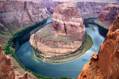 High angle view of river passing through mountains