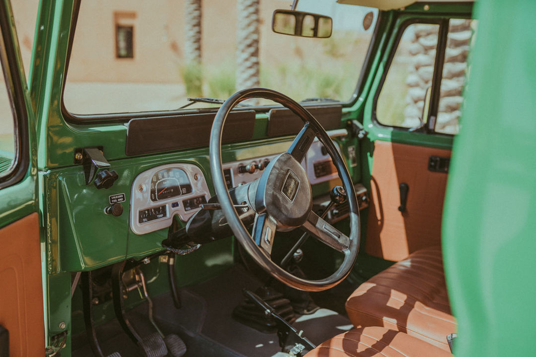 car, vehicle, transportation, land vehicle, mode of transportation, motor vehicle, antique car, vehicle interior, off-road vehicle, no people, steering wheel, travel, vintage car, day, green, retro styled