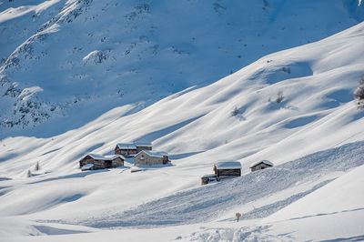 Scenic view of snow covered mountains