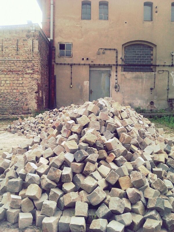 architecture, building exterior, built structure, stone wall, brick wall, old, house, wall - building feature, stone - object, cobblestone, abandoned, stone material, day, building, window, residential building, damaged, outdoors, stack, brick