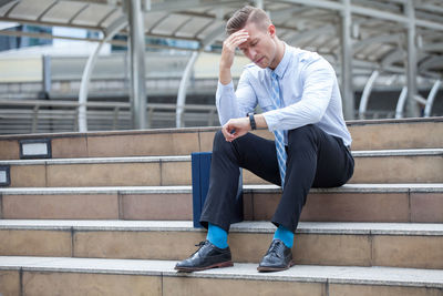 Man sitting on staircase