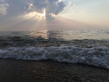 Scenic view of sea against sky during sunset