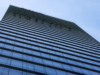 Low angle view of modern building against clear sky