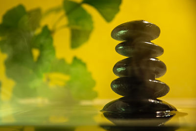 Close-up of stone stack on table