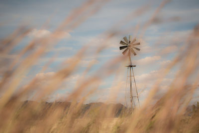 View of wind turbine in field
