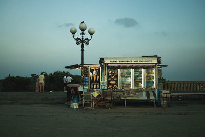 Built structure on street against sky