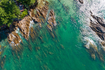 High angle view of rock formation in sea