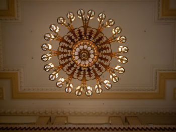 Low angle view of illuminated chandelier