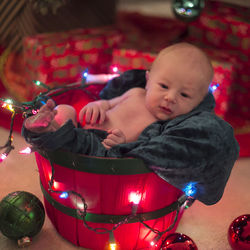 Close-up of baby boy playing at home