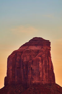 Scenic view of rocky mountains against sky during sunset