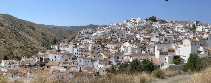 The white village of almáchar in the axarquia region of southern spain. 