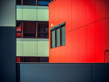 Reflection of building on glass window