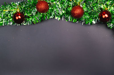 Close-up of cherries against white background