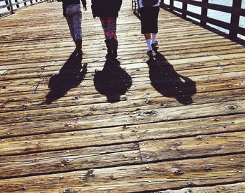 Low section of woman standing on ground