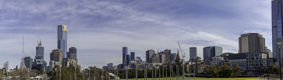 Panoramic view of modern buildings against sky