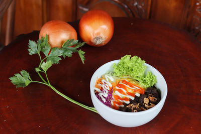 High angle view of vegetables in bowl on table