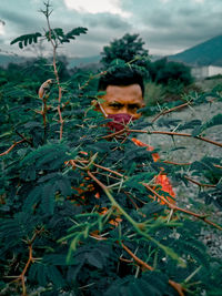 Portrait of young man outdoors